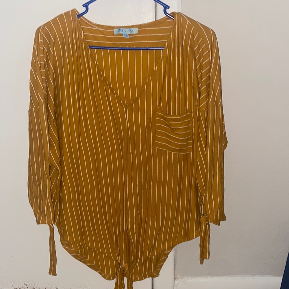 This is a cute shirt I bought from a boutique about 6 months ago. Barely worn
